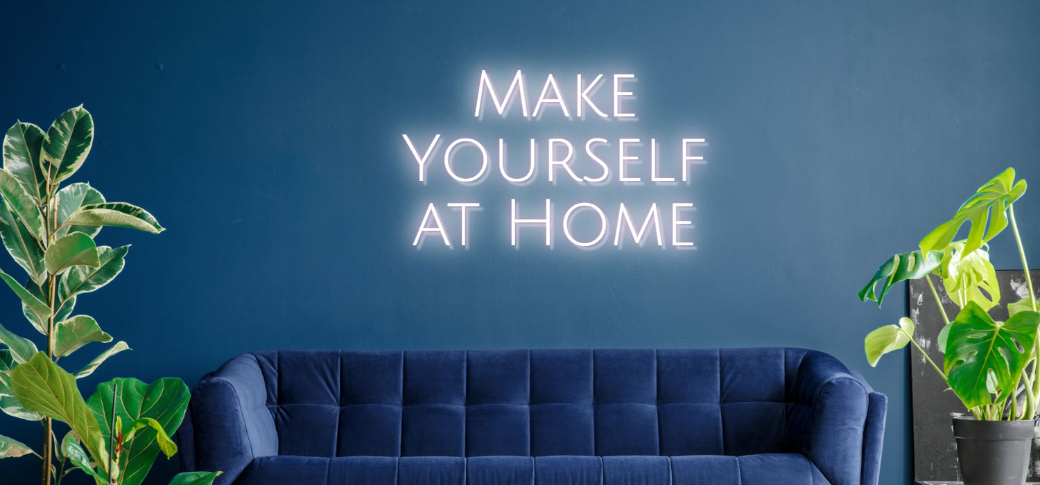 Make your self at home Hotel sign