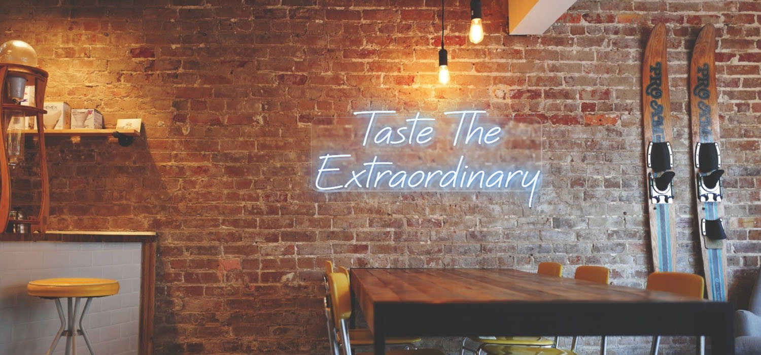 Taste The Extraordinary Restaurant Sign